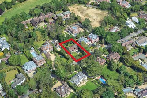 6 bed property, in Coombe Hill Road, £2,450,000