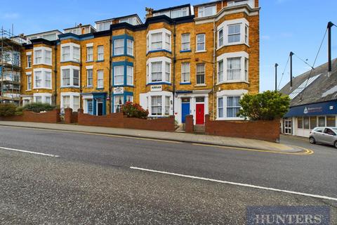 1 bed property, in North Marine Road, £60,000