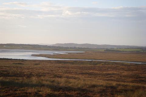Land, in Back, £20,000