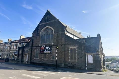 Land, in Locke Street, £200,000