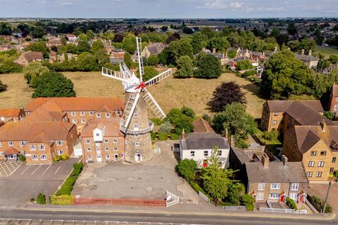 8 bed property, in Maud Foster Mill & Mill House, £895,000