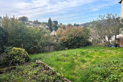Land, in Old Bristol Road, £200,000
