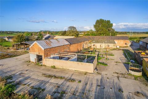Land, in Station Road, £700,000