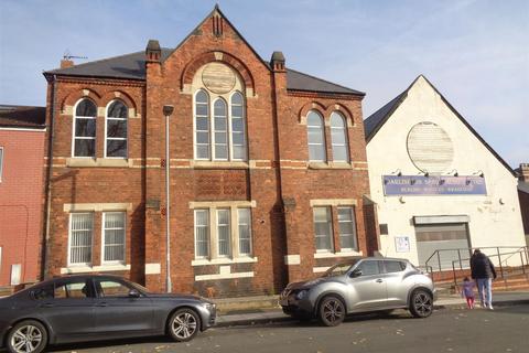 Land, in Denmark Street, £195,000