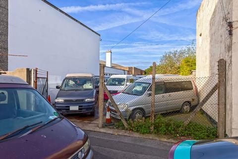 Land, in North Street, £250,000