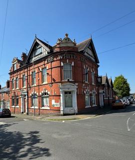 Land, in The White Lion, £375,000