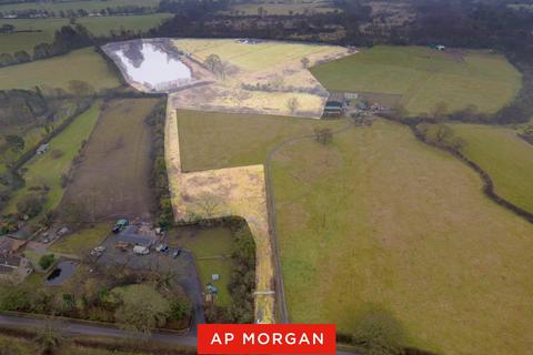 Land, in Stonehouse Lane, £400,000