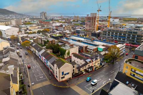 Land, in Christina Street, £625,000