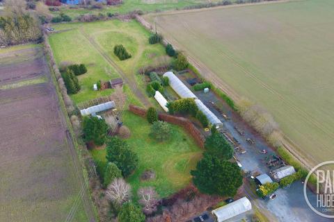 Land, in Leicester Road, £500,000