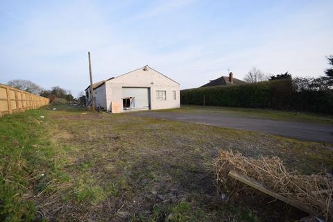 Land, in Main Road, £140,000