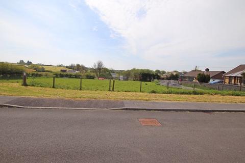 Land, in Maes Cawnen, £130,000