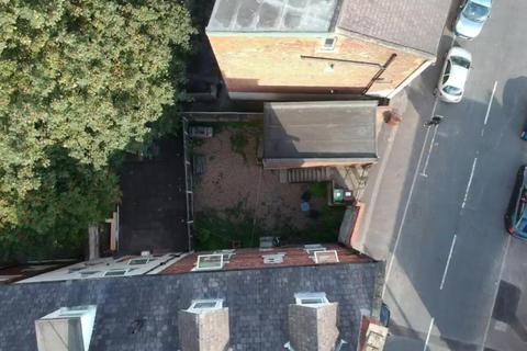 Land, in College Grove Road, £40,000