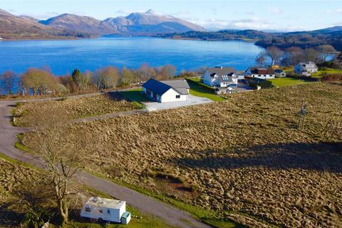 Land, in Plot 2 At Achnacairn, £85,000