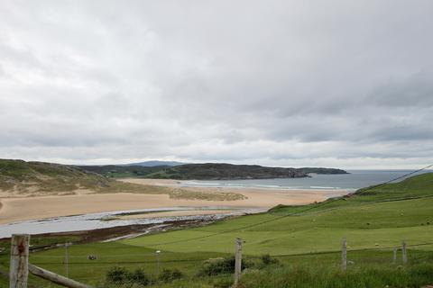Land, in Plot at Dalcharn, £45,000