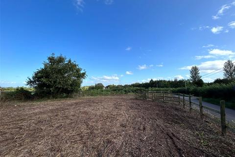 Land, in Maunsel Road, £125,000