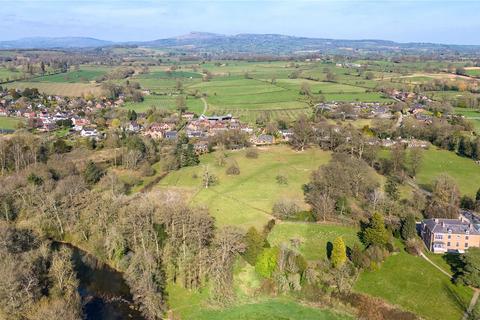 Land, in Ashford Carbonel, £215,000