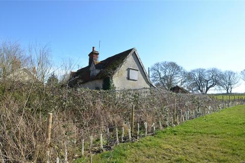Land, in Peasenhall, £250,000