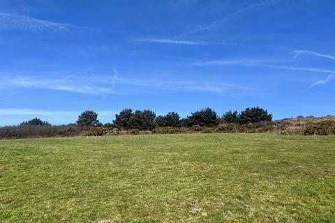 Land, in Tresowes Hill, £75,000