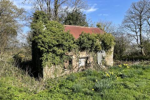 Land, in Trood's Cottage, £175,000