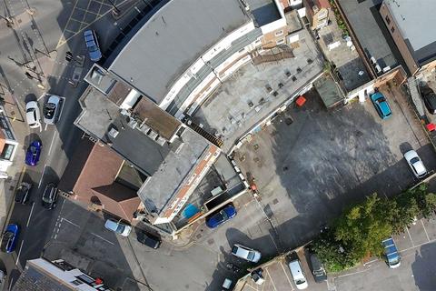 Land, in High Street, £1,000,000