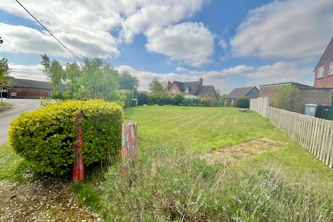 Land, in Windmill Lane, £100,000