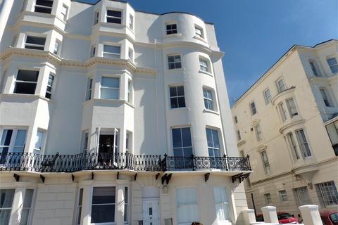 Land, in Marine Parade, £125,000