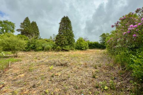 Land, in Trefrew Road, £125,000