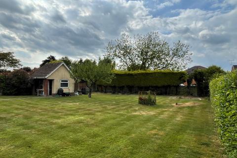 Land, in Chapmans Close, £160,000