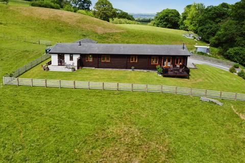 Land, in Llandinam, £695,000