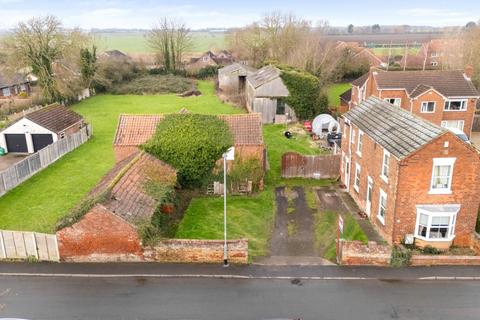 Land, in West Street, £600,000