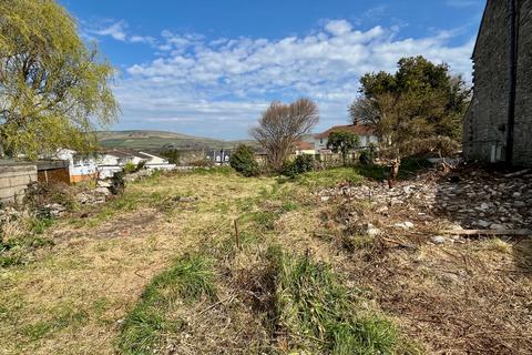 Land, in BELL STREET, £220,000
