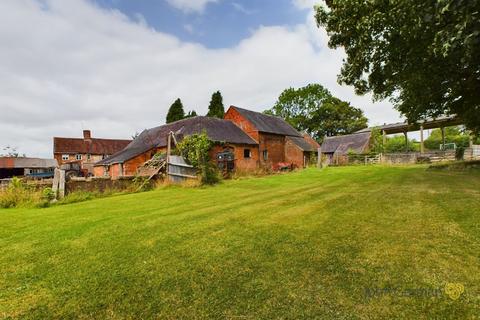 Land, in Roston, £550,000