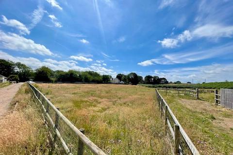 Land, in Land adjacent to Derry Farm, £140,000