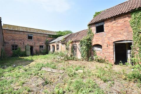 Land, in Main Street, £600,000