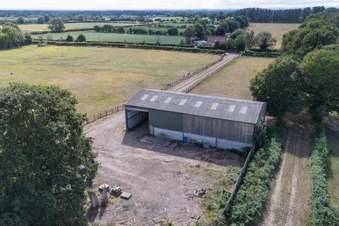 Land, in Easingwold Road, £375,000