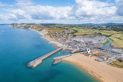 8 bed property, in West Bay, £730,000