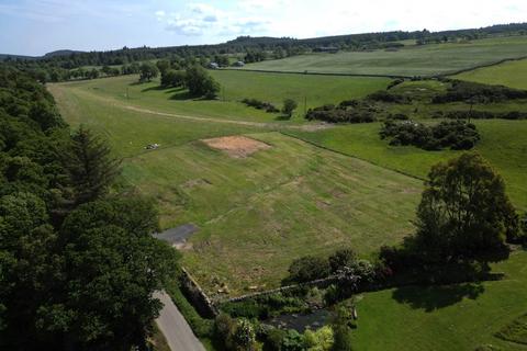 Land, in Plot 1 At Drumore Of Cantray, £140,000