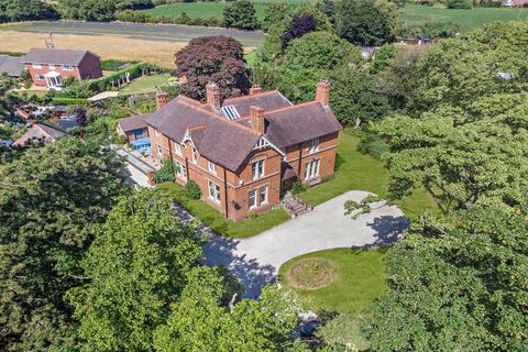 7 bed property, in Soulton Road, £1,000,000