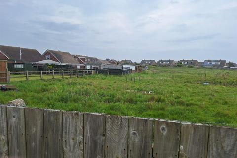 Land, in Site Off, £80,000