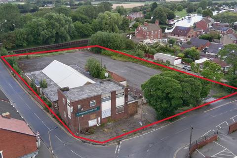 Land, in Stainforth Central Club, £300,000
