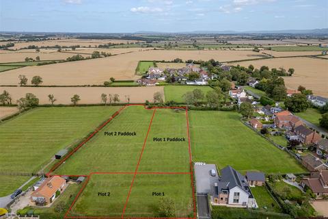 Land, in Long Lane, £180,000