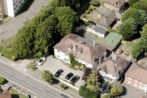 21 bed property, in Station Road, £3,500,000
