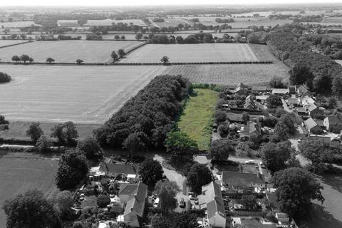 Land, in Willingham St. Mary, £750,000