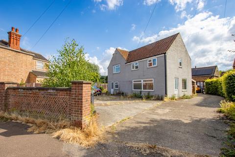 Land, in Manor Road, £225,000