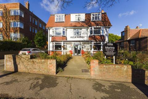 Land, in Northstead Manor Drive, £500,000