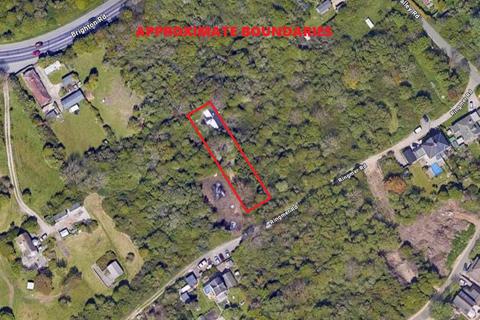 Land, in Ringmer Road, £65,000
