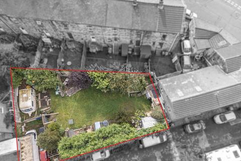 Land, in New Street, £170,000