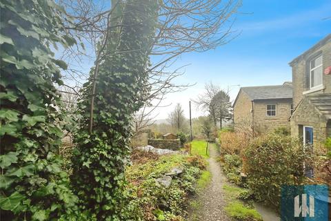Land, in New Hey Road, £33,000