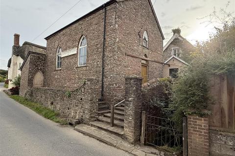 Land, in Atherington, £144,000