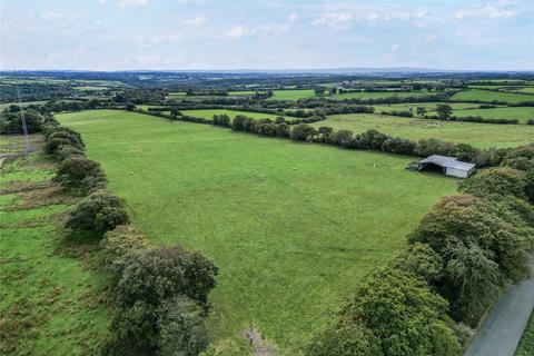 Land, in Rackenford, £100,000